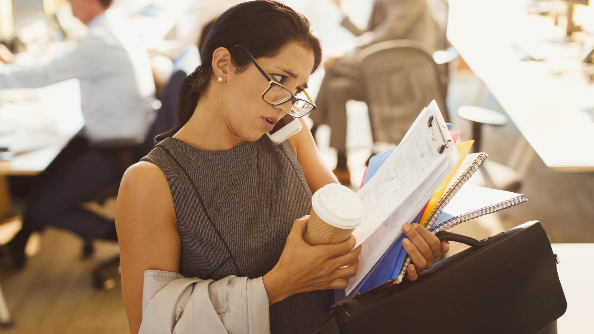 multitasking woman busy at work
