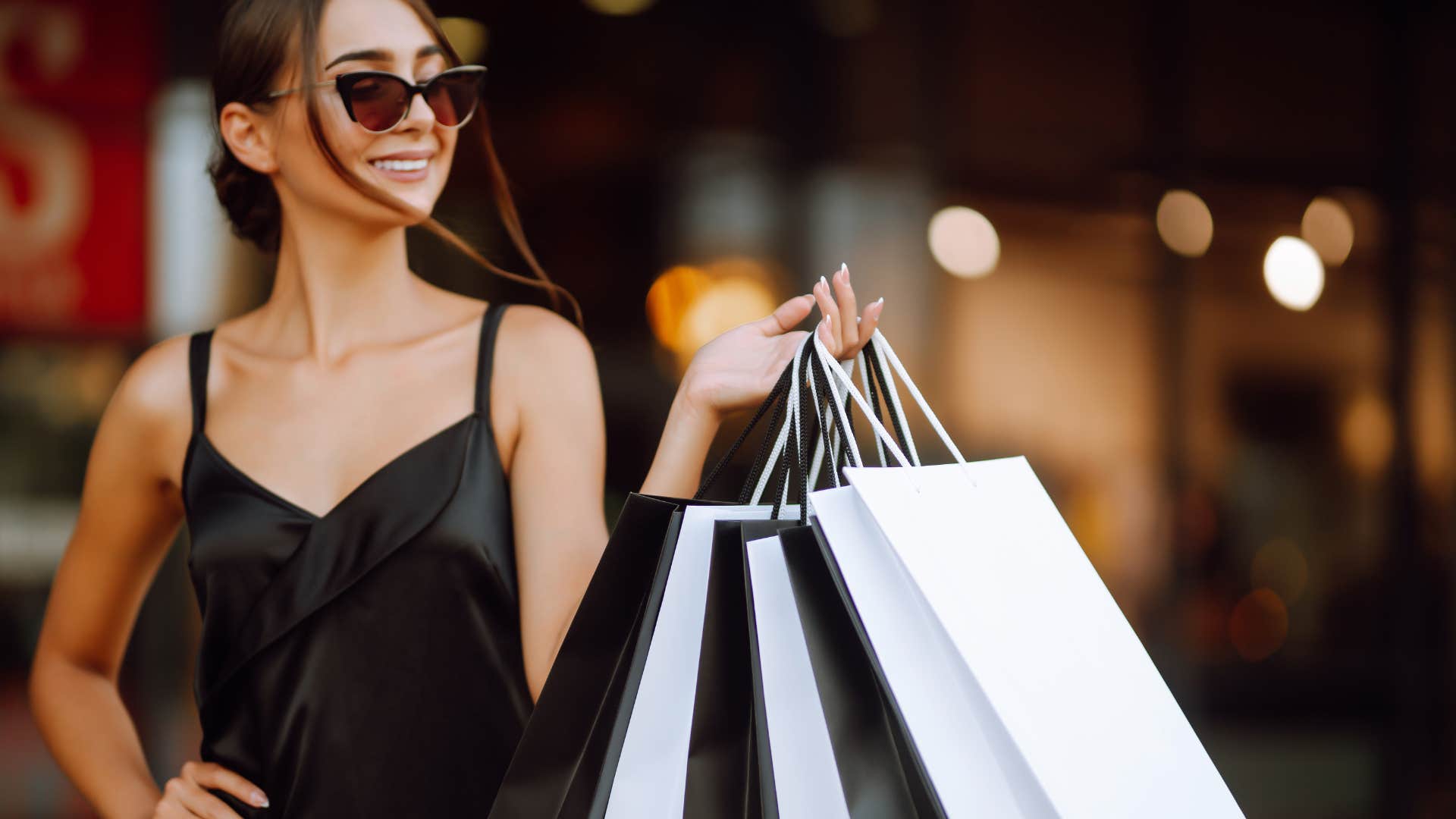 woman who spends tons of money on little things because she is self-indulgent