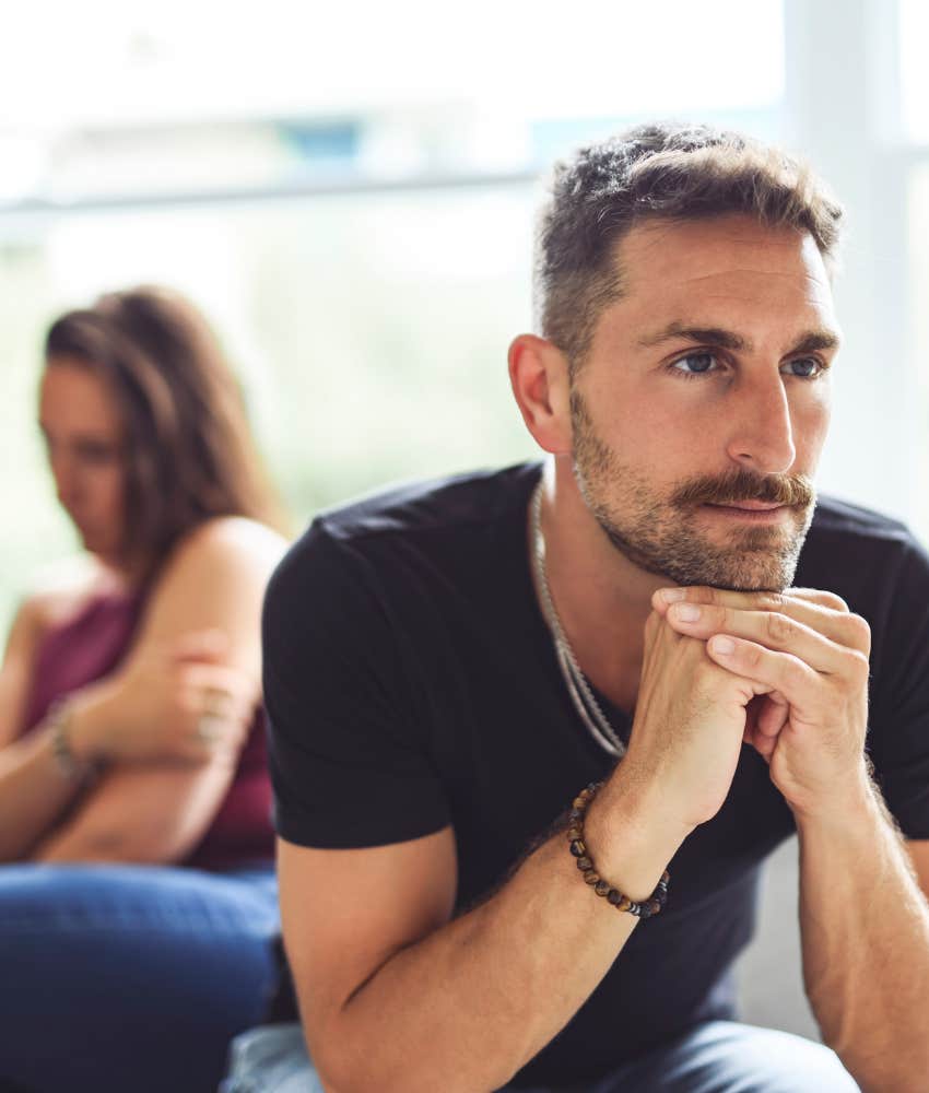 Unhappy person turns back on partner showing other hidden reason sty in relationship