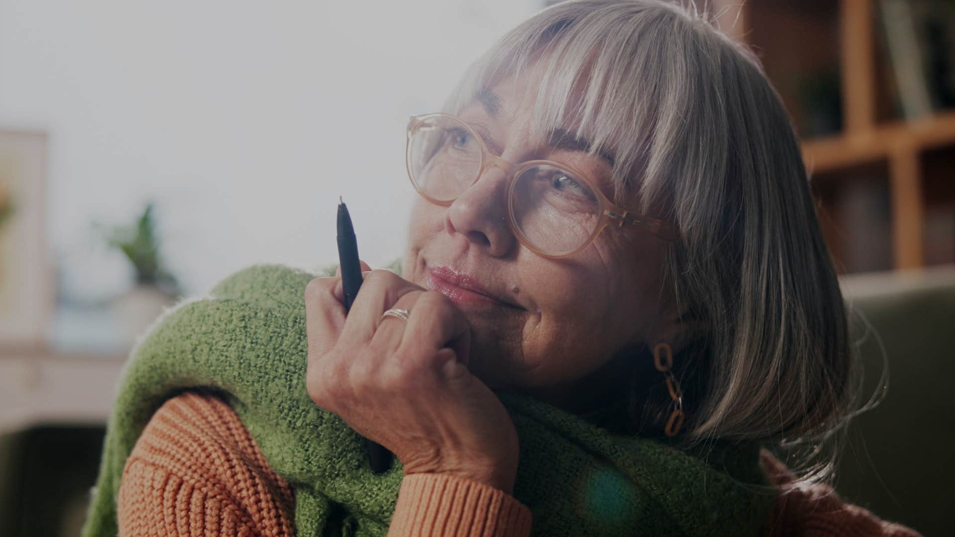 creative woman thinking while staying up late