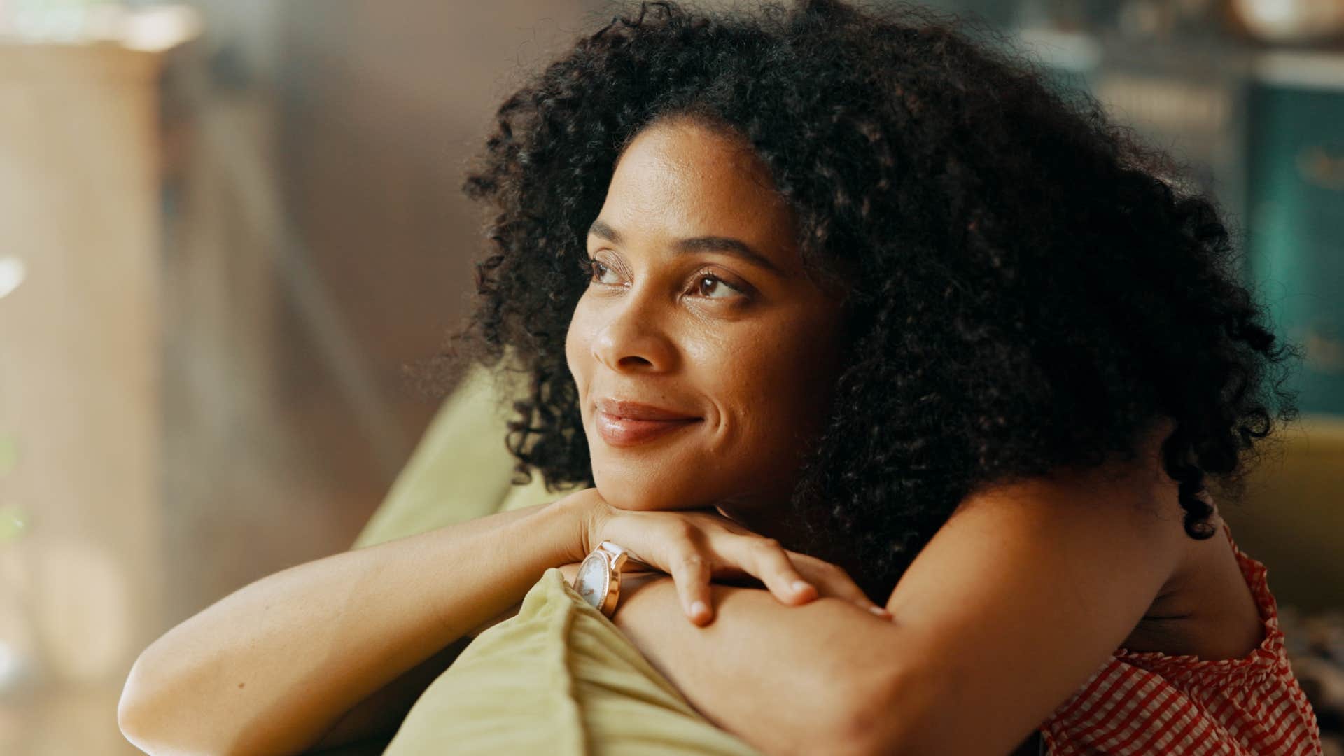 incredibly empathetic woman smiling staying up late to get time alone