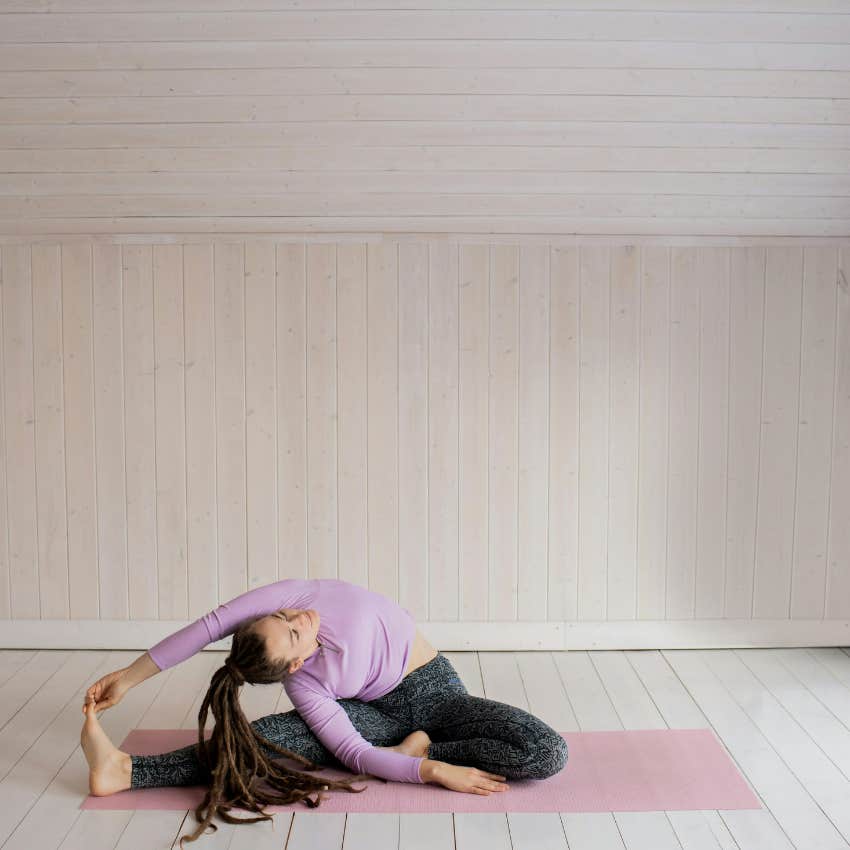 woman doing leisure activity of yoga