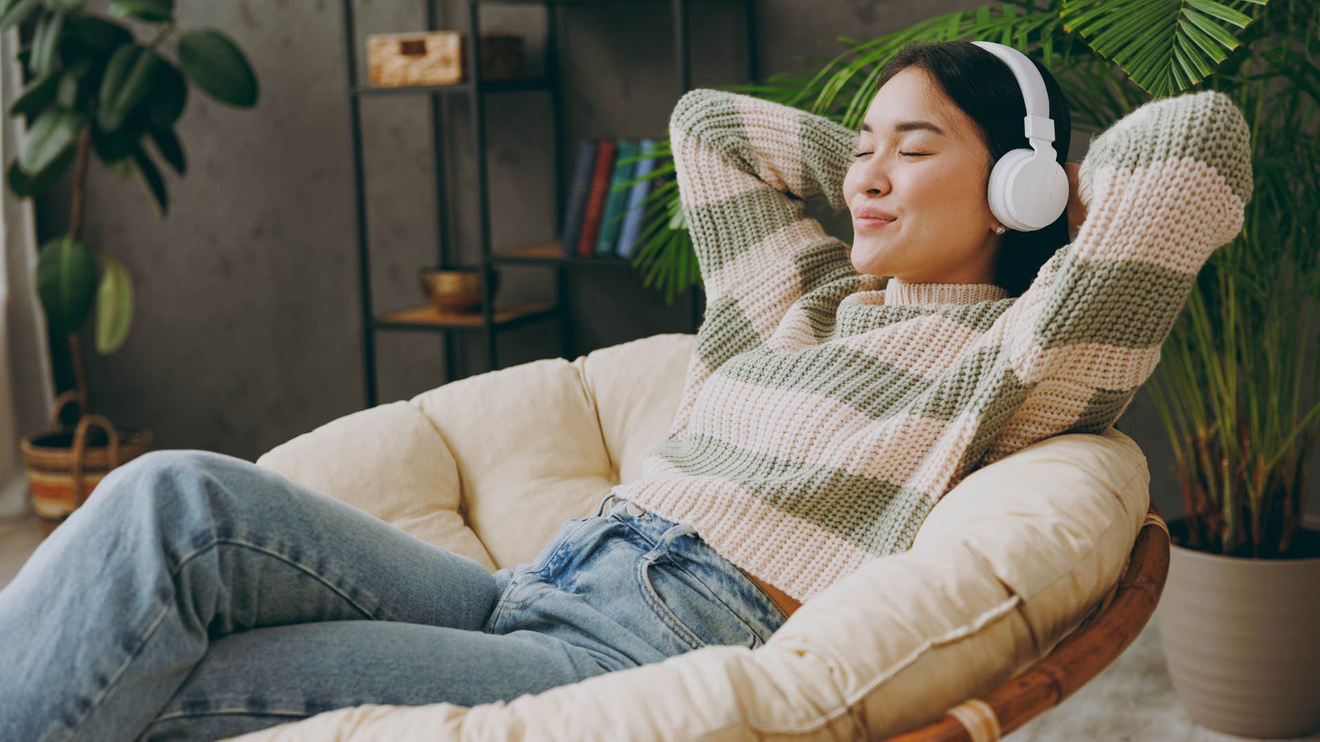 woman relaxing with headphones on the weekend