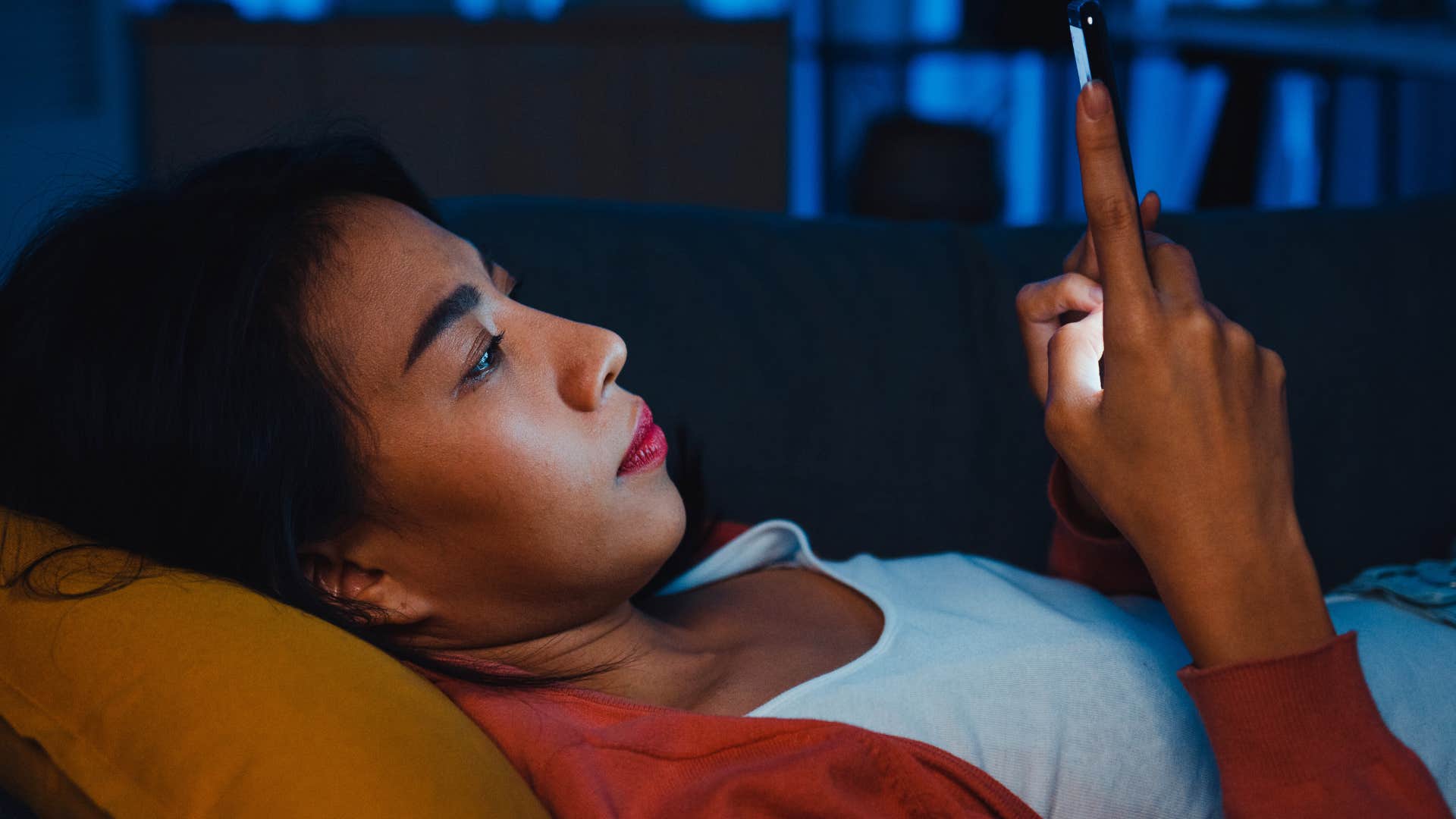 Blank person scrolls social media showing self-worth tied to relationship