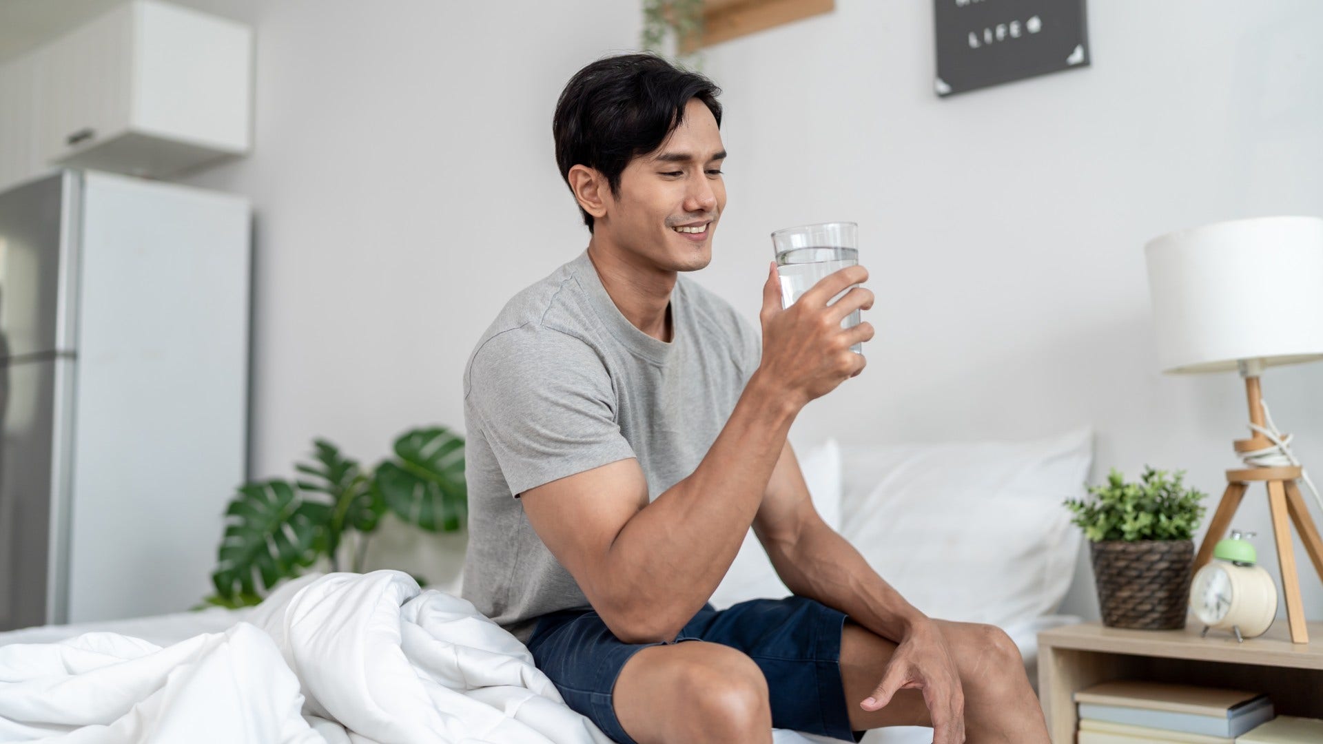 man who wakes up before alarm goes off with lower morning anxiety