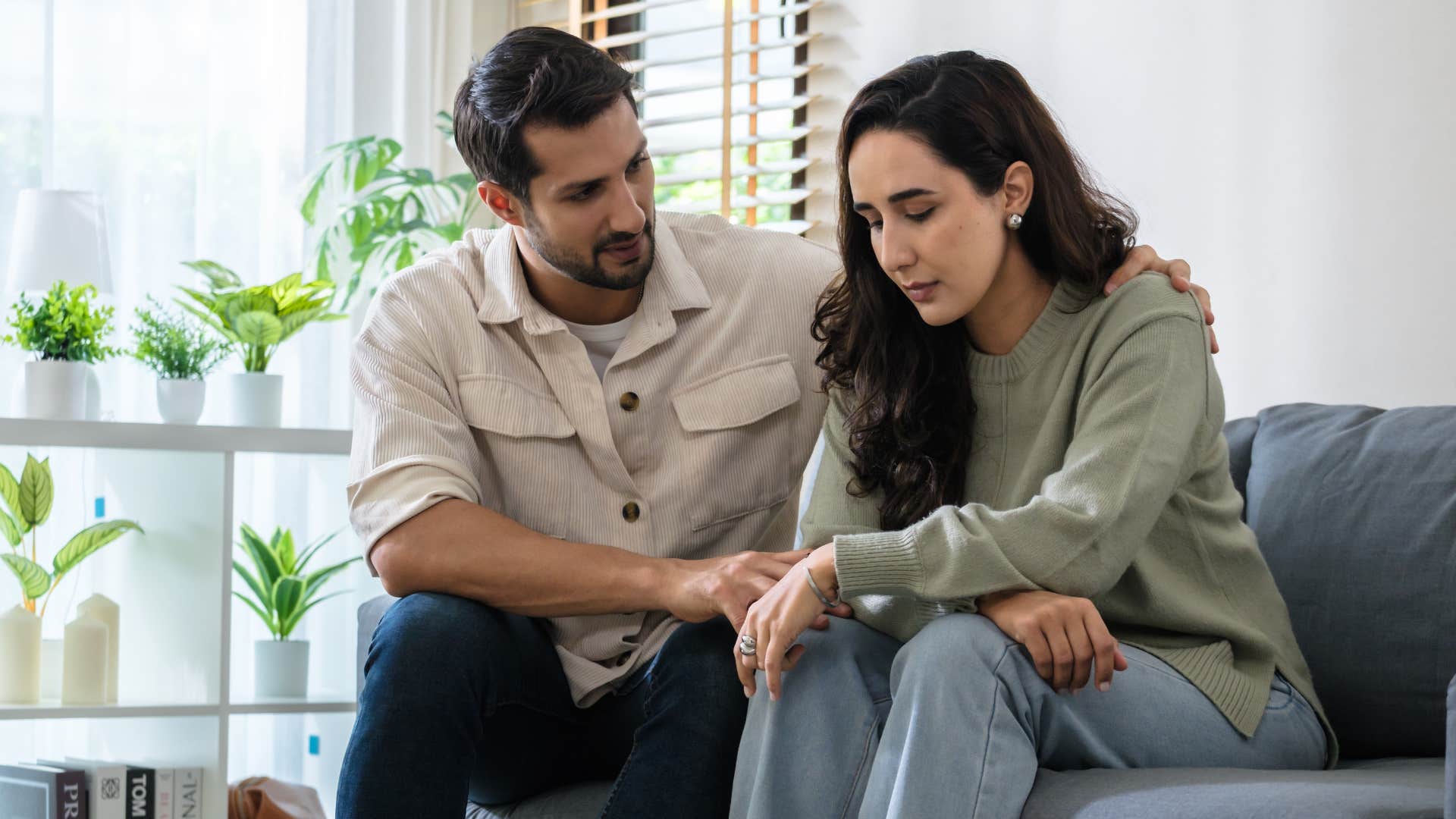 woman whose face gives away every emotion being open and vulnerable with partner
