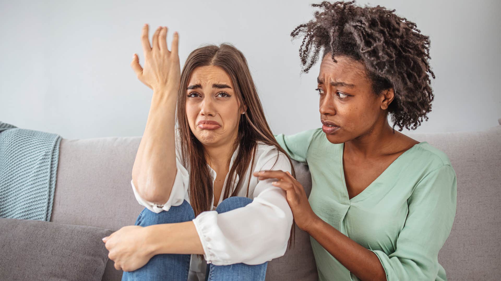 woman who refuses to bottle up her emotions crying to friend