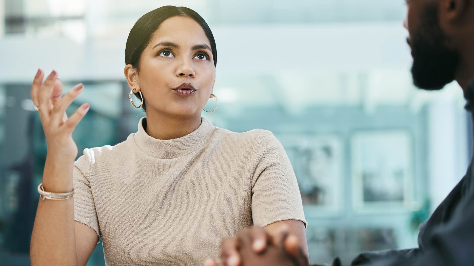 self-assured woman in a work meeting