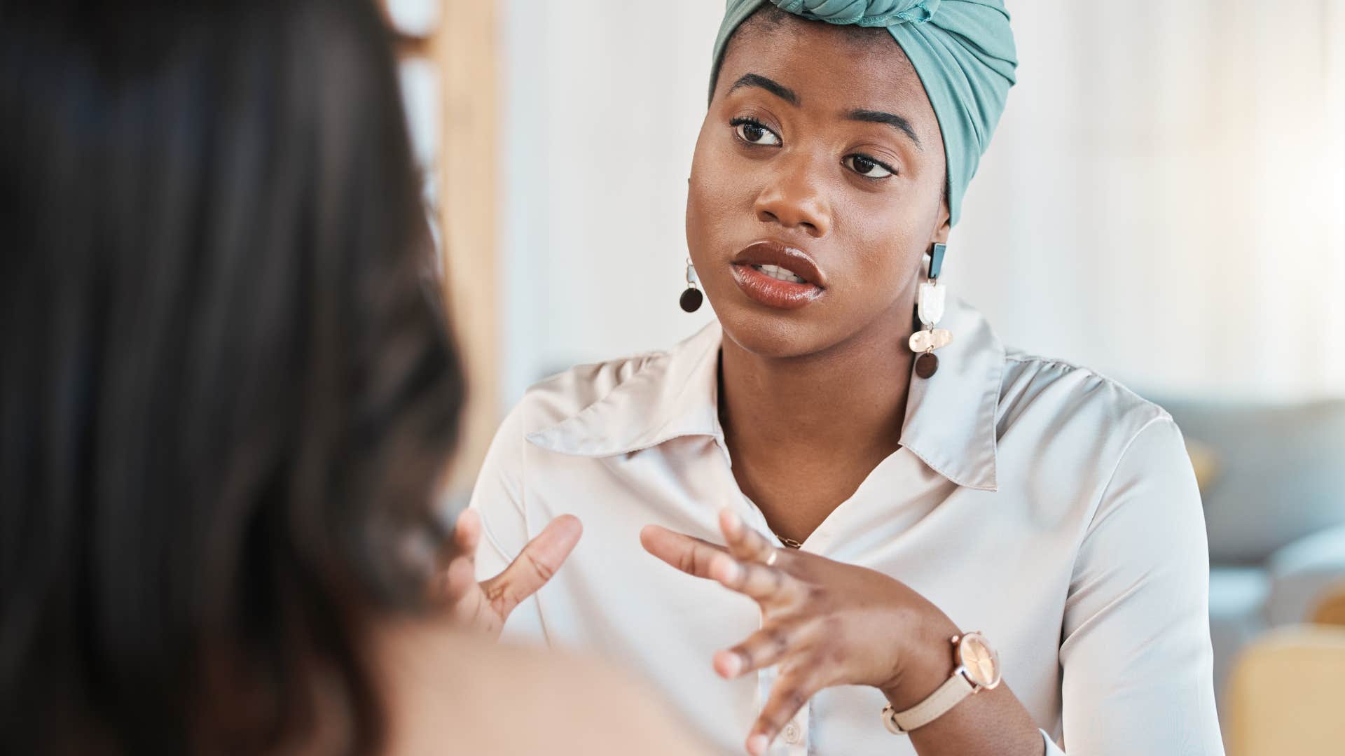 woman speaking with friend