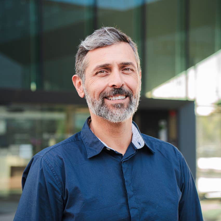 smiling older man with beard