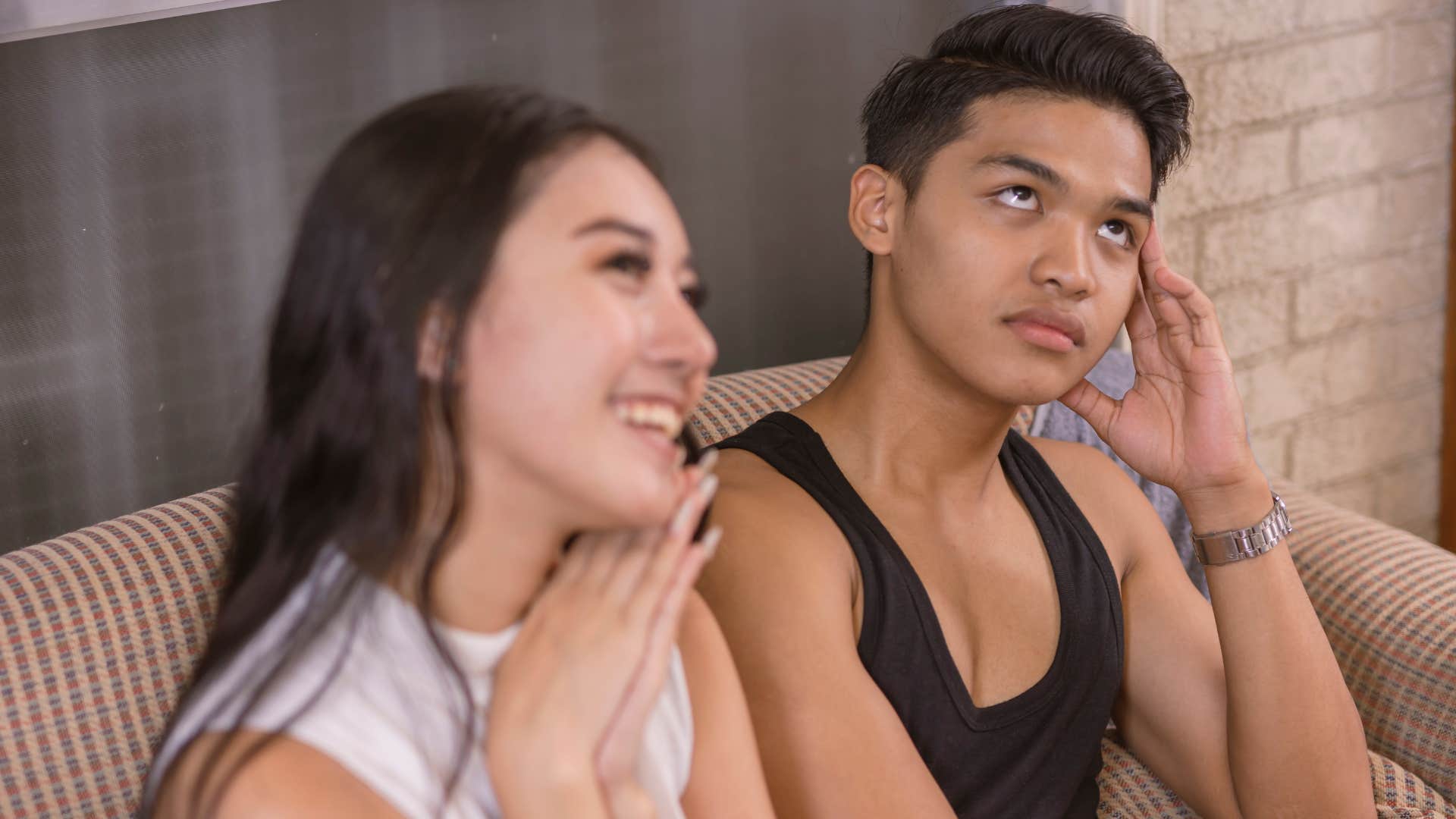 man feeling frustrated with woman who only talks about herself