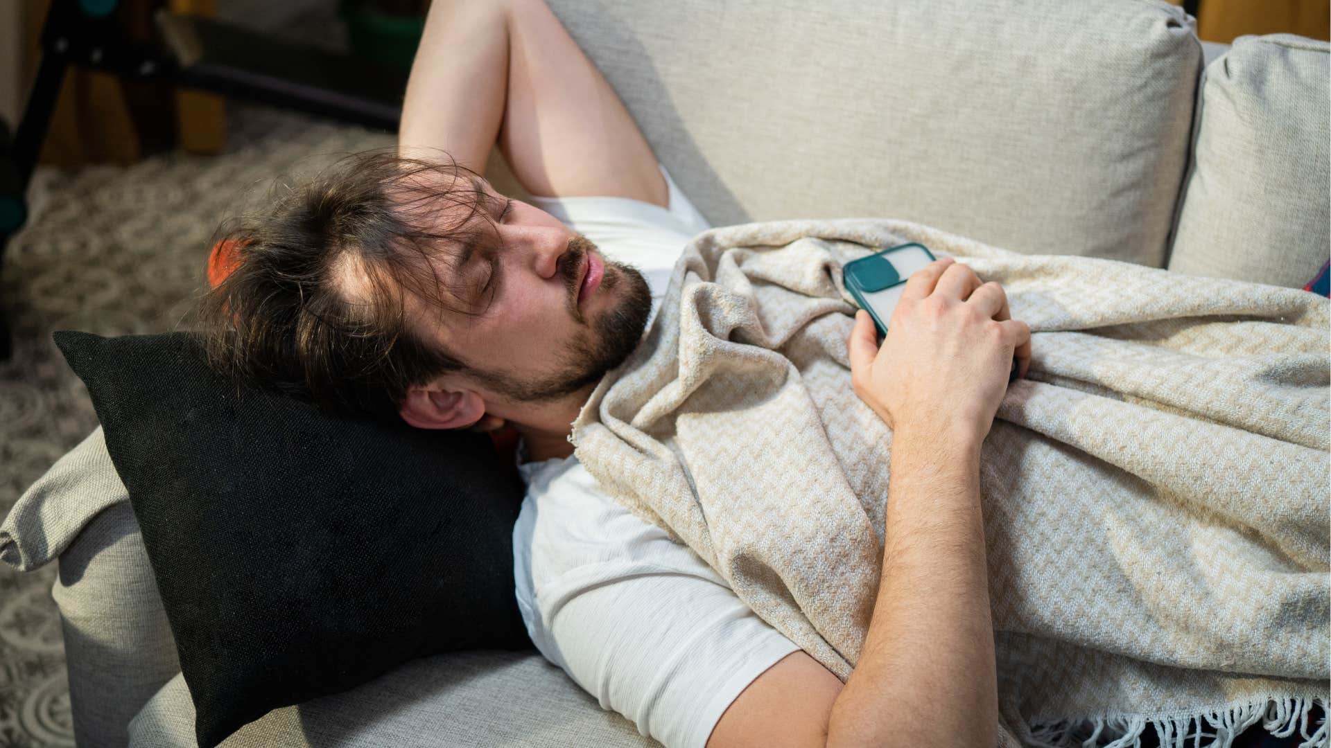 Sleeping person on couch showing don't ignore poor employment record