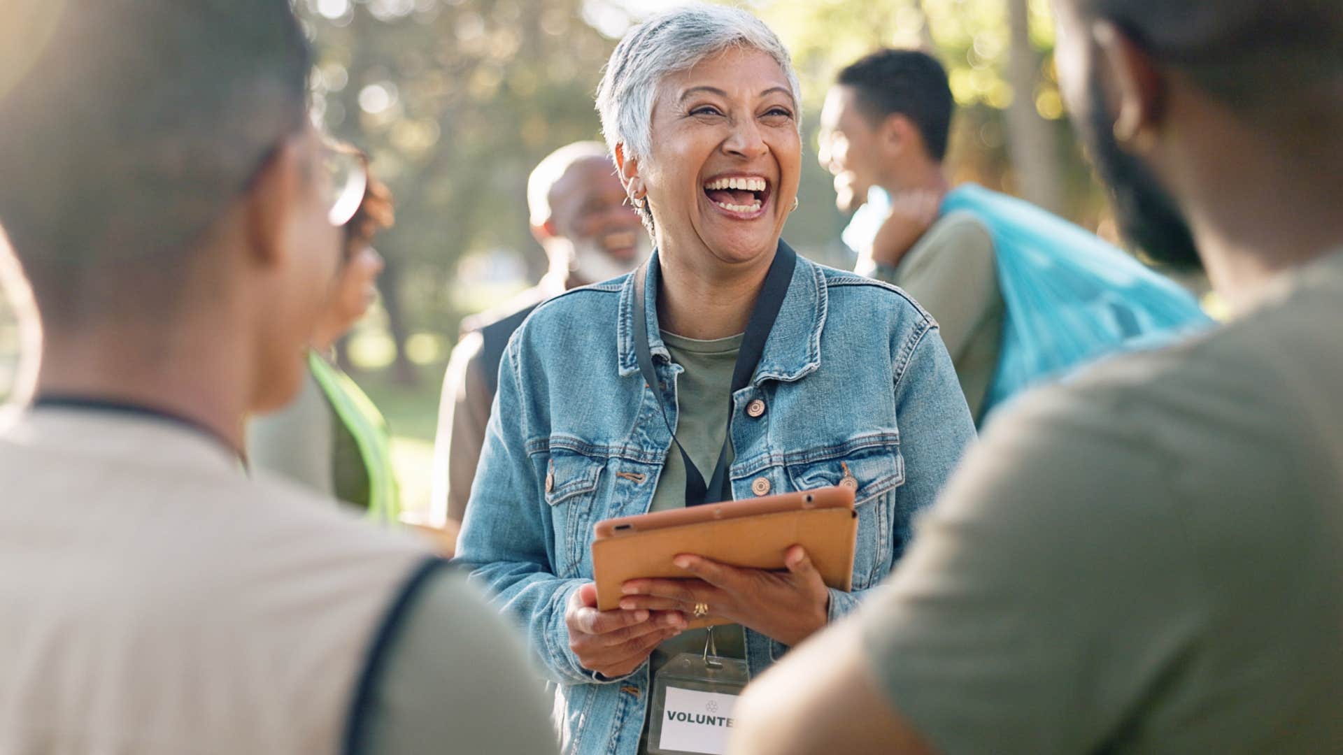 Woman laughing and smiling more with her friends.