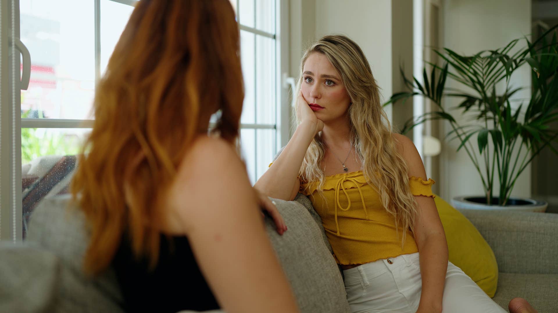 Woman who validates your feelings smiling with a friend.