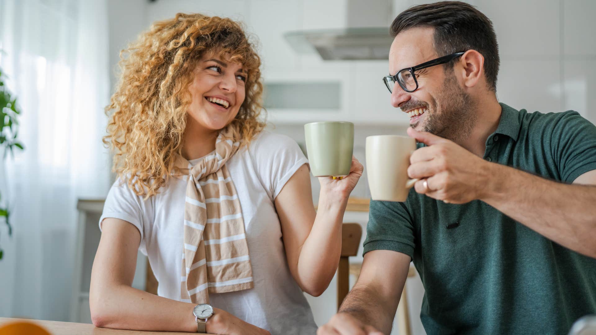 man who offers small acts of kindness smiling with his wife