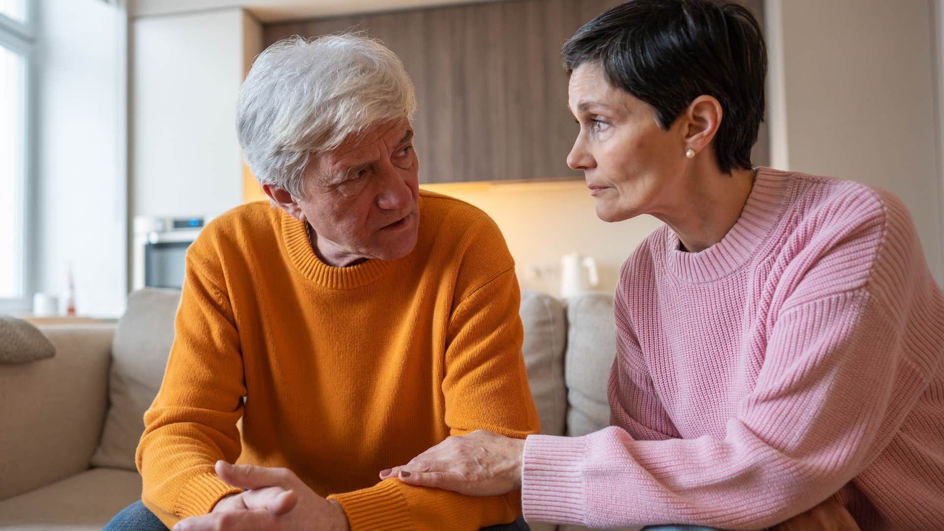 man who openly expresses his emotions with his wife in conversation
