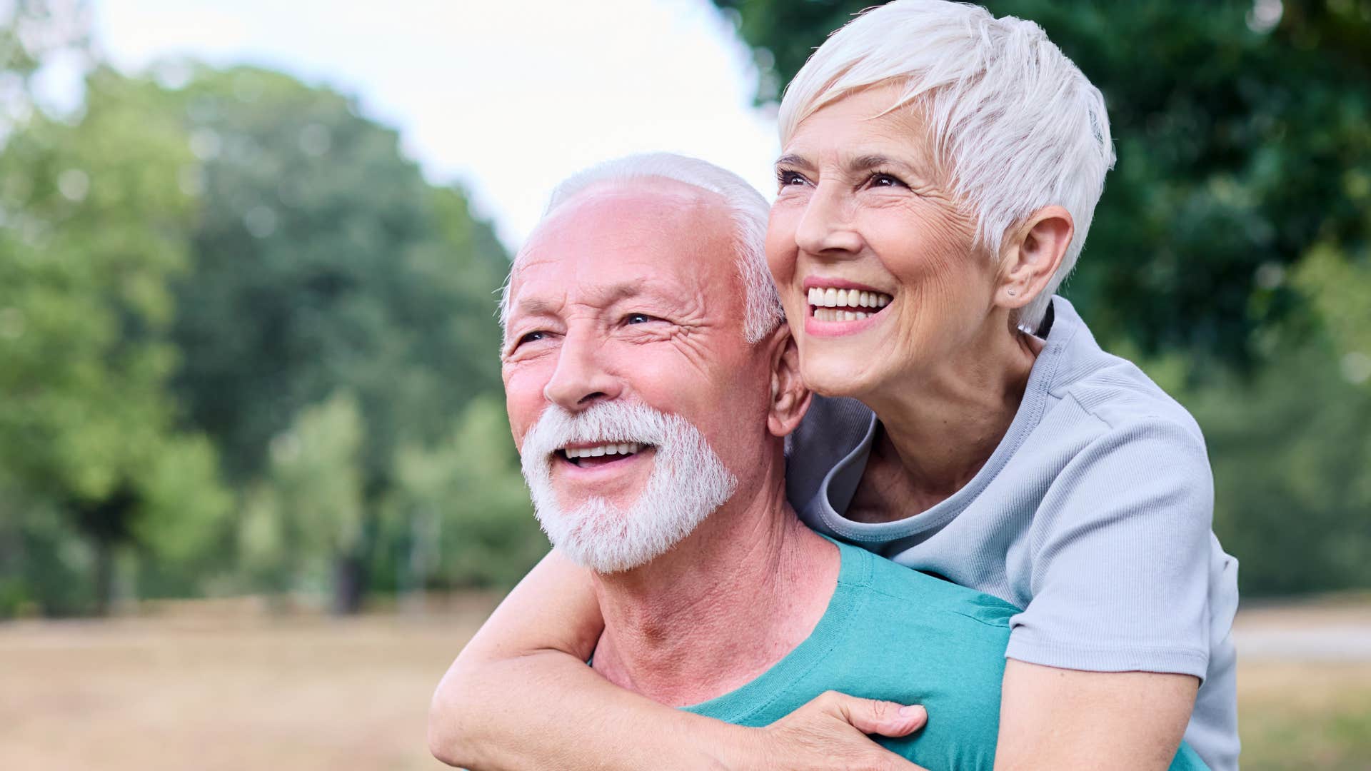 woman hugging husband from behind who respects her boundaries
