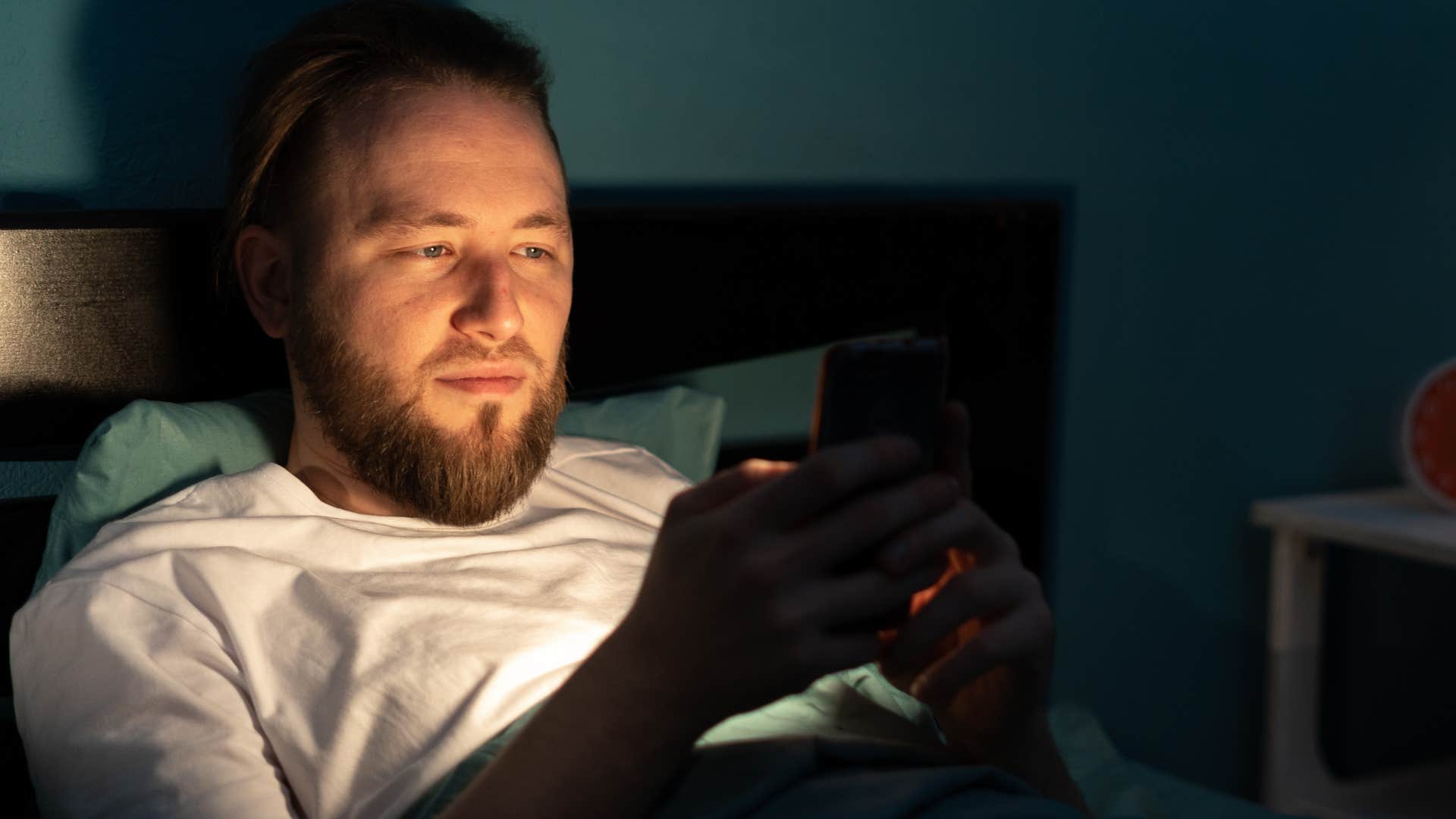 gen z man on his phone seeking instant gratification