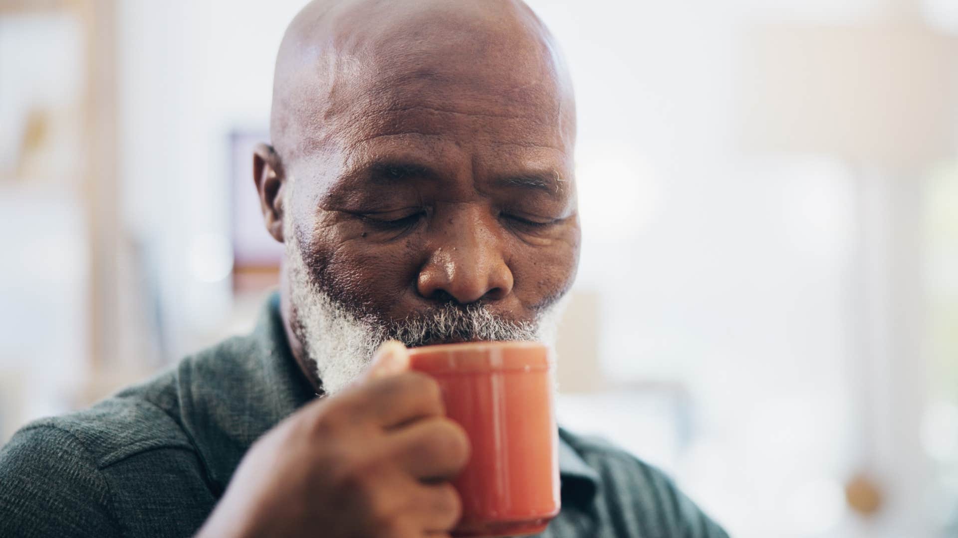 retired older man drinking coffee enjoying not being needed