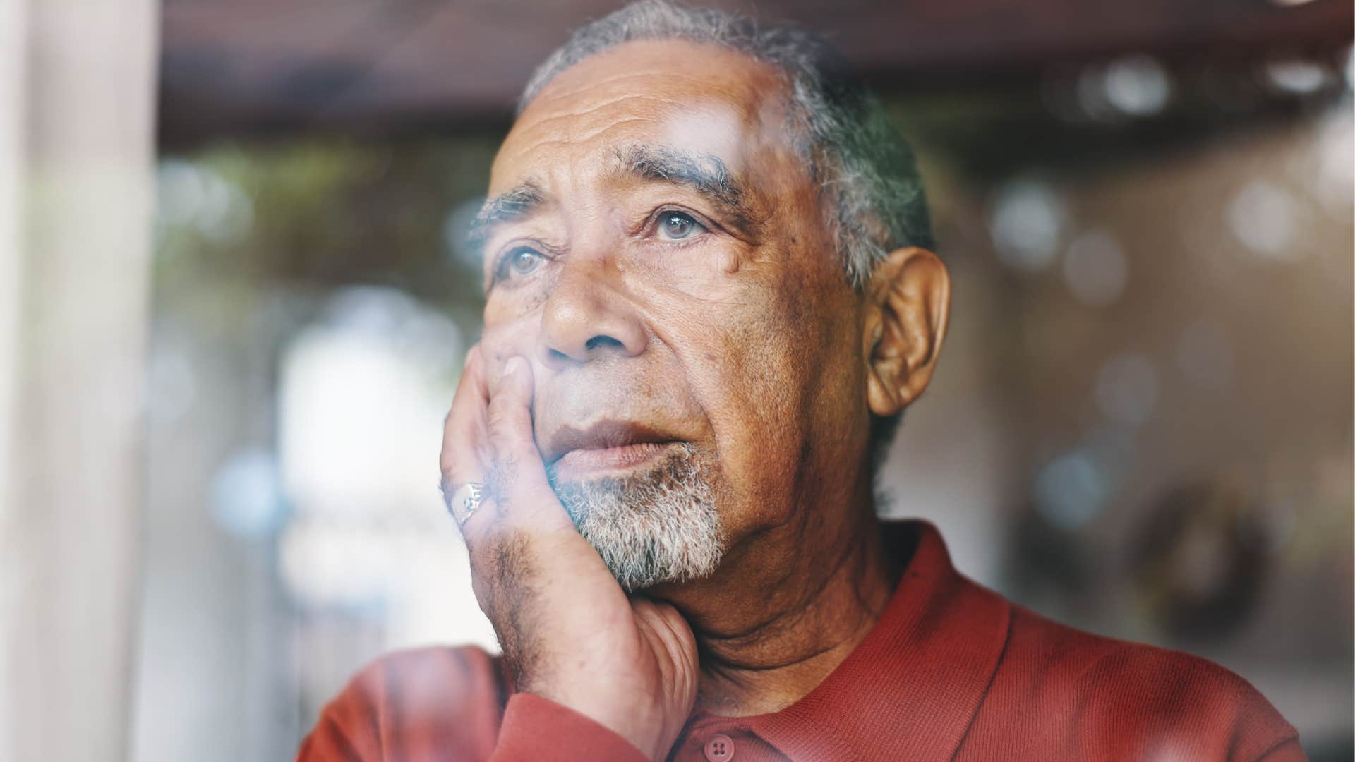 retired older man focusing on his travel dreams