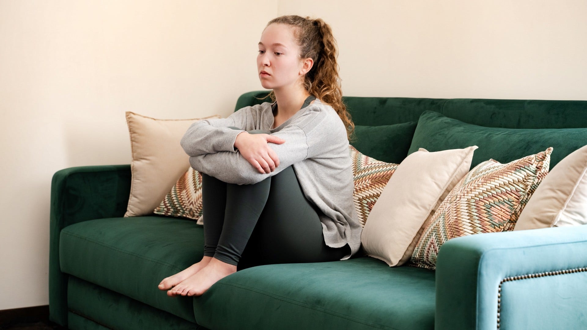 woman who feels emotionally exhausted keeping her emotions private