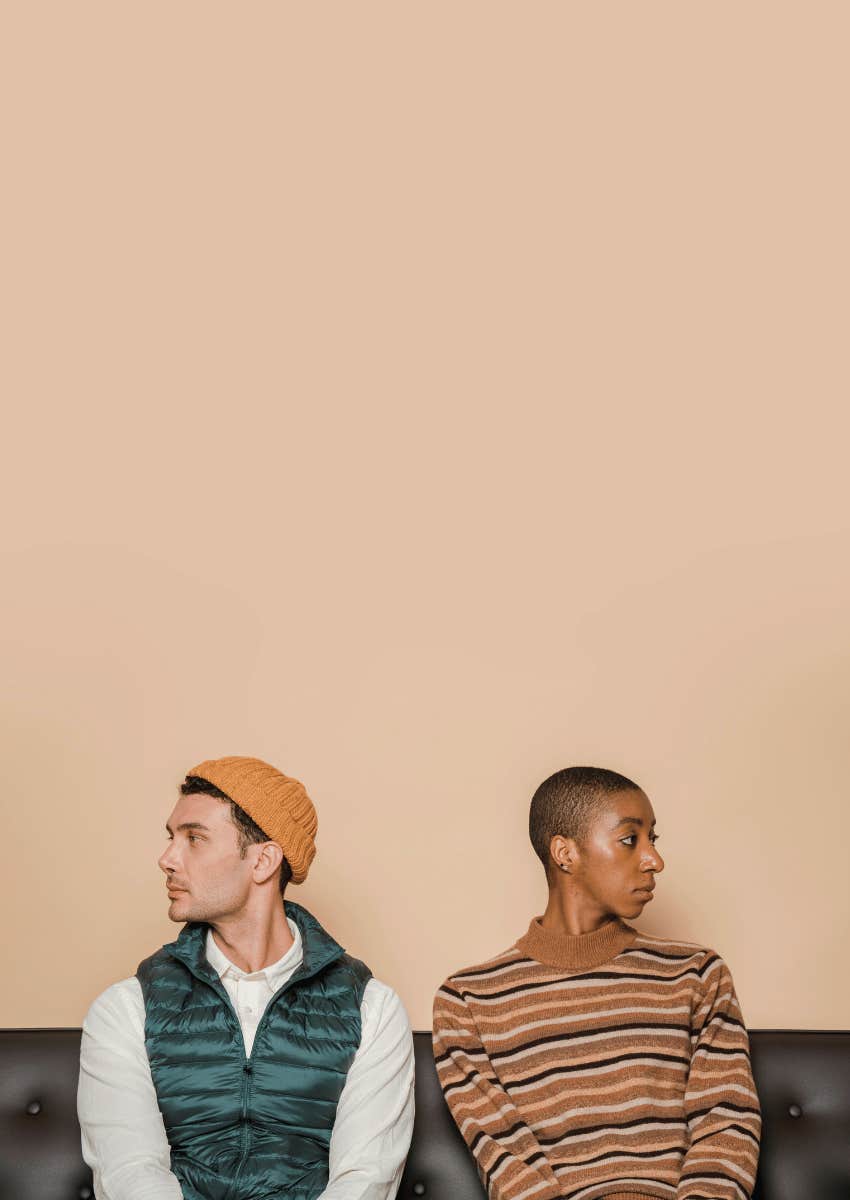 serious couple facing away from each other