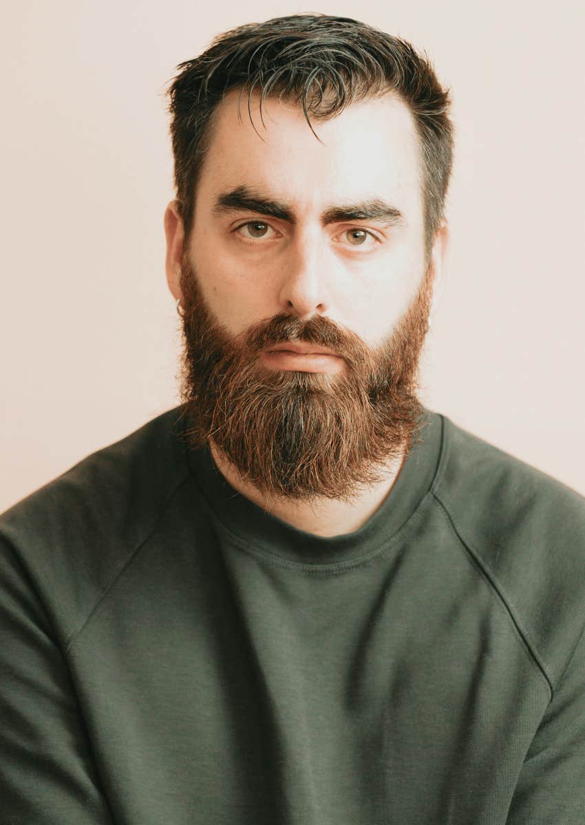 serious man talking less because he doesn't want to get hurt