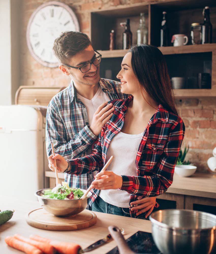 couple enjoying cooking together