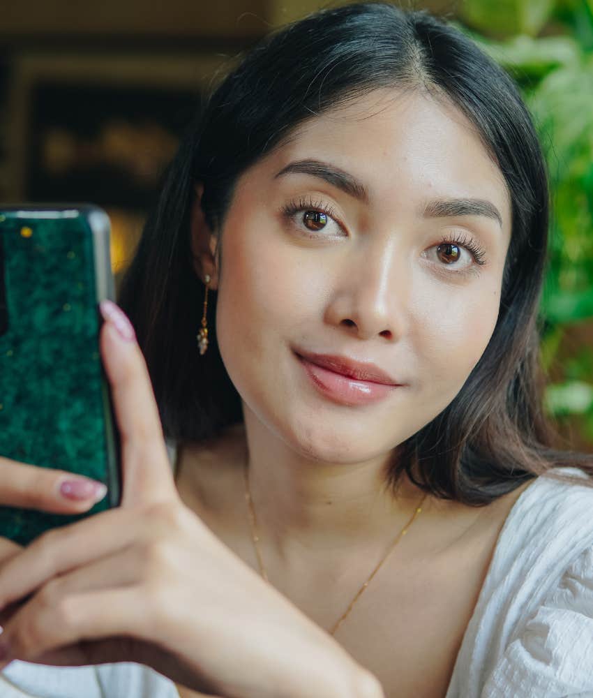 Mysterious person smiles