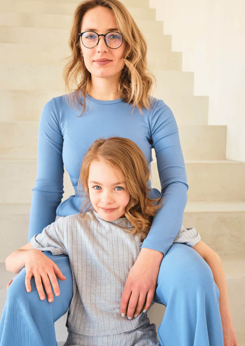 single mom posing with her child