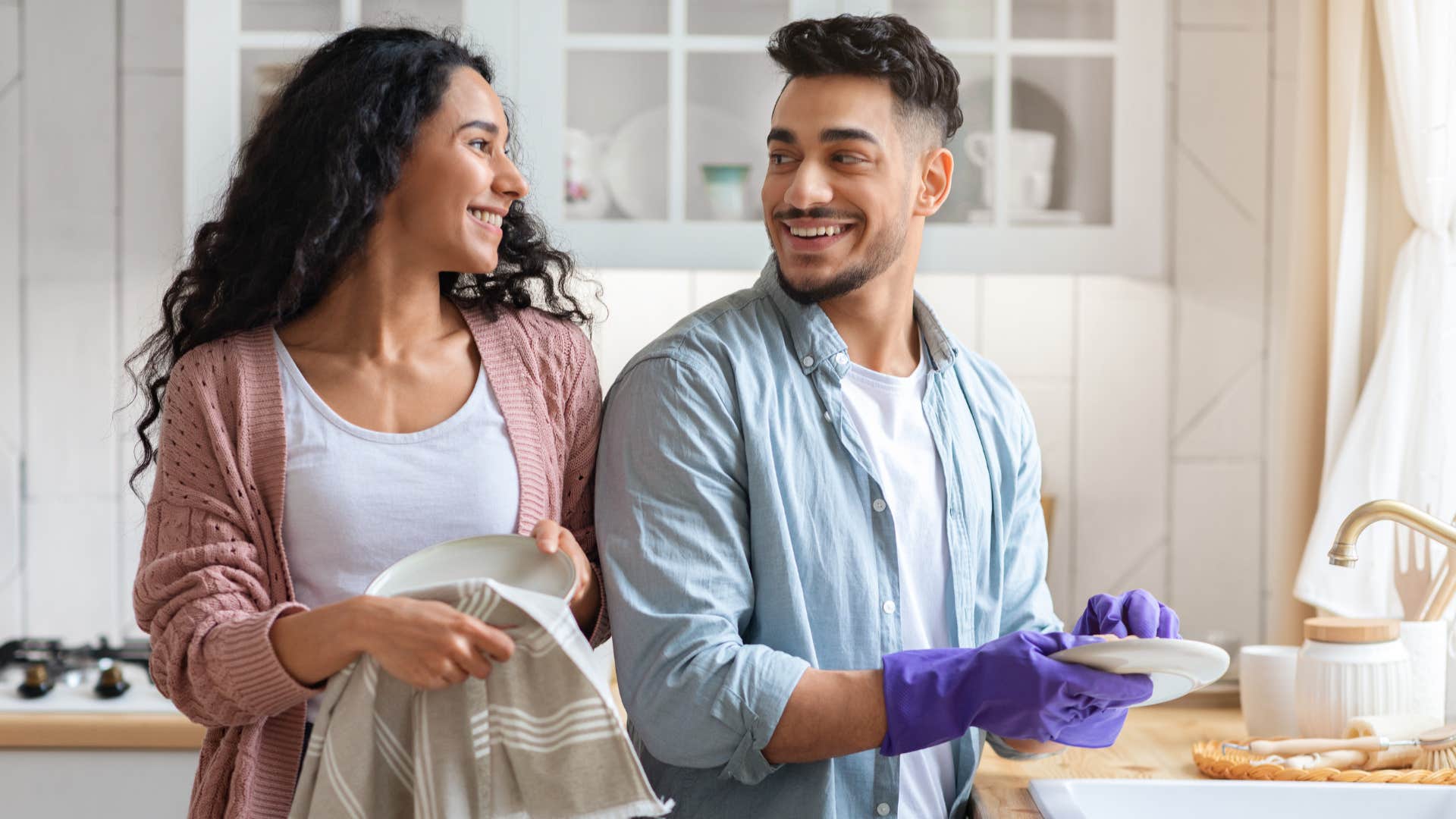 man respecting woman helping her with chores