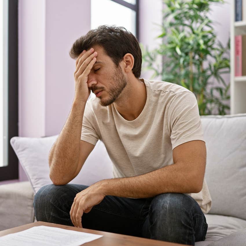 man stressed about buying tickets