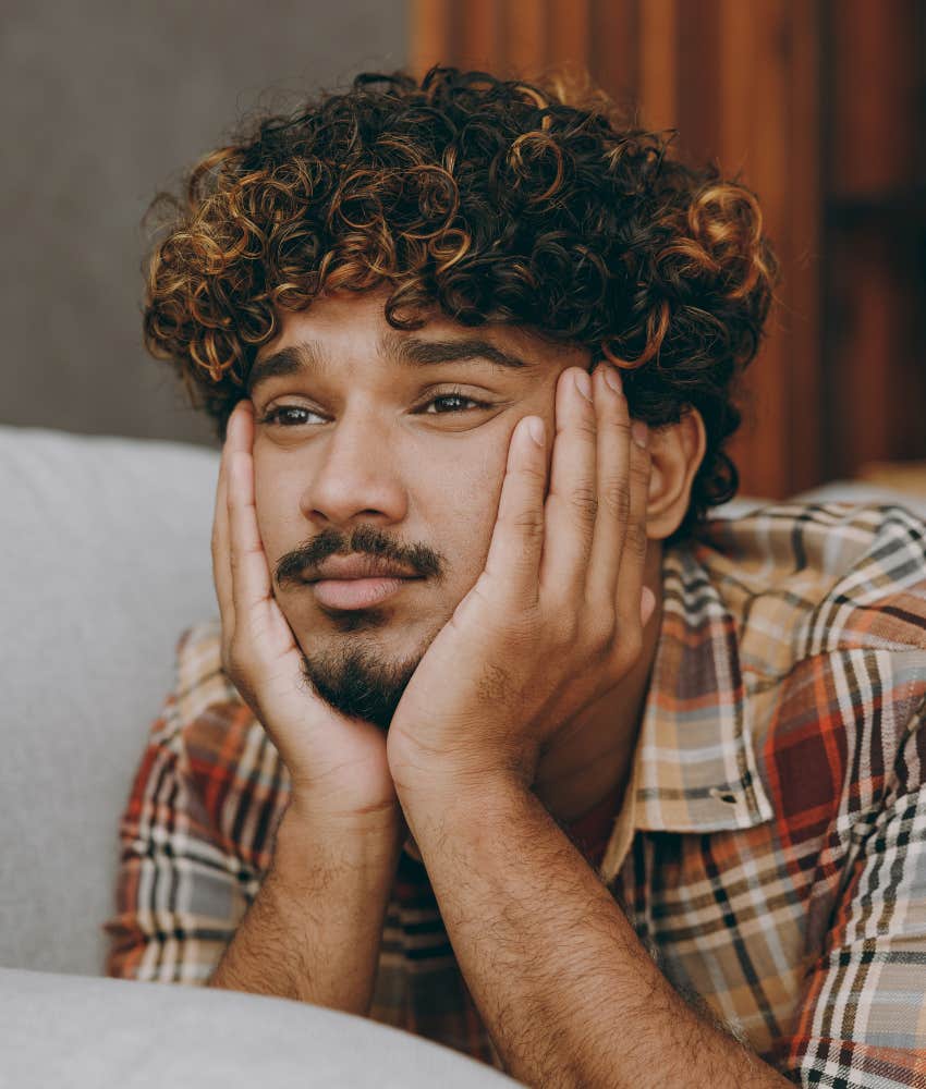 Introspective person with head on hands showing way to lean in to feelings