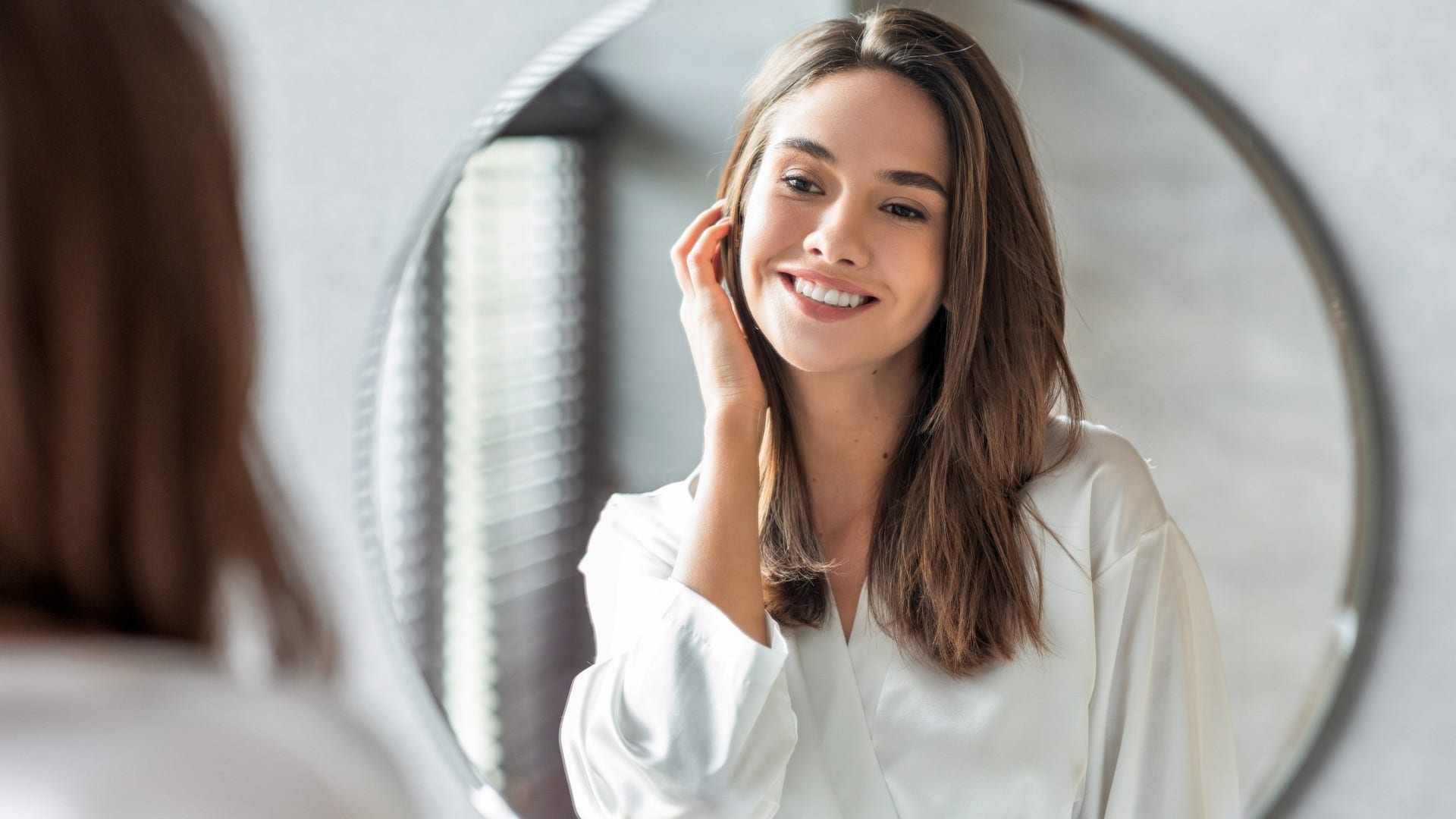 woman who has outgrown herself feeling slightly unfamiliar to herself