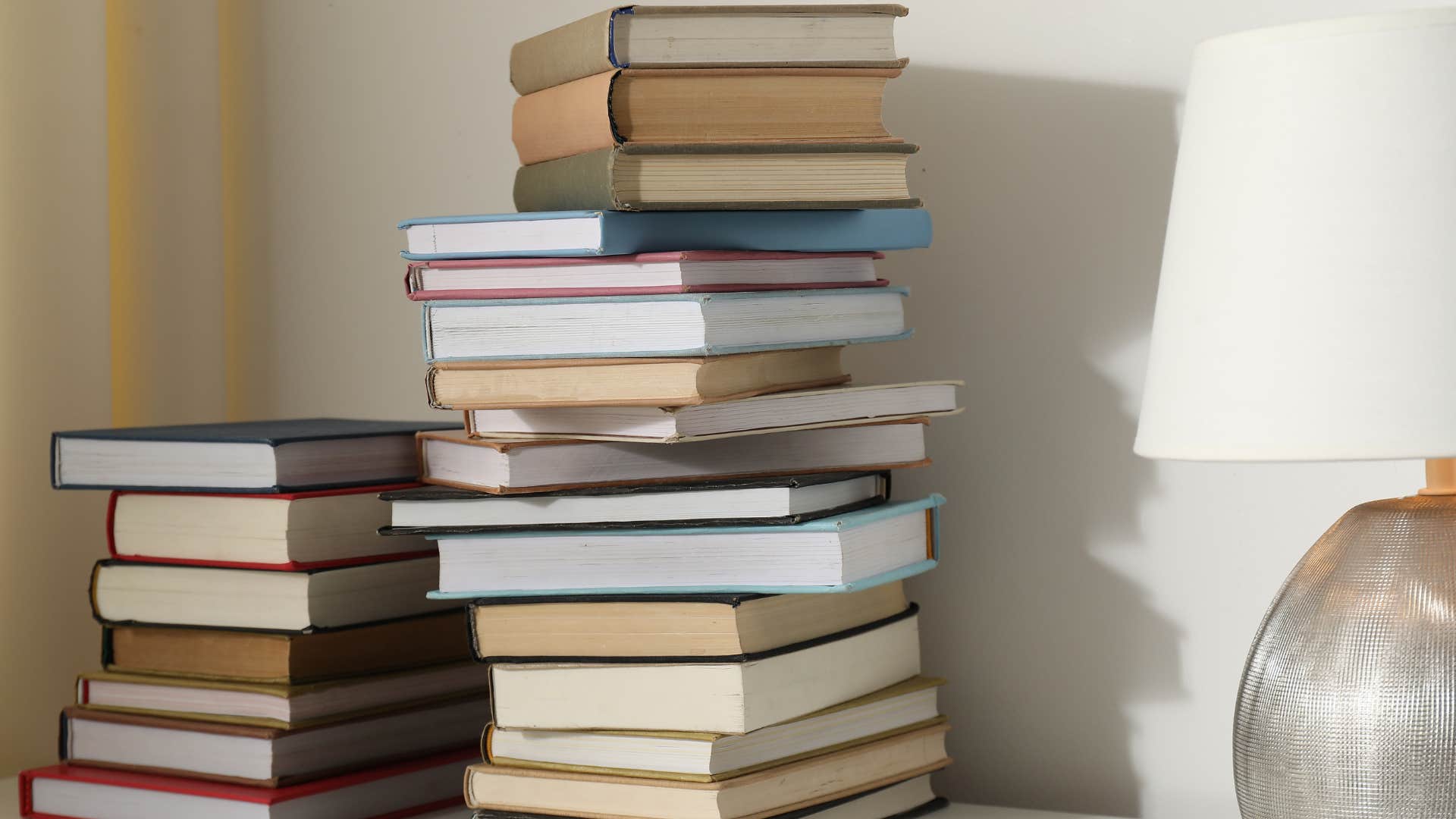 things brilliant people put into piles around the house instead of putting them back where they belong books they want to read