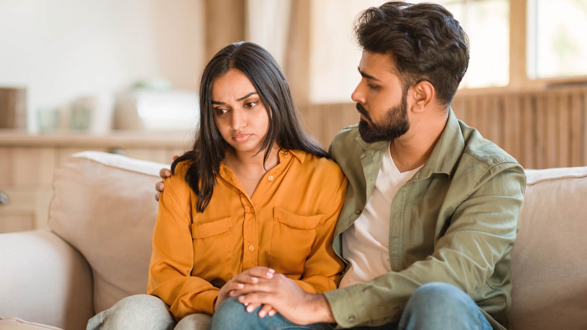 man who knows that relationships require work comforting wife