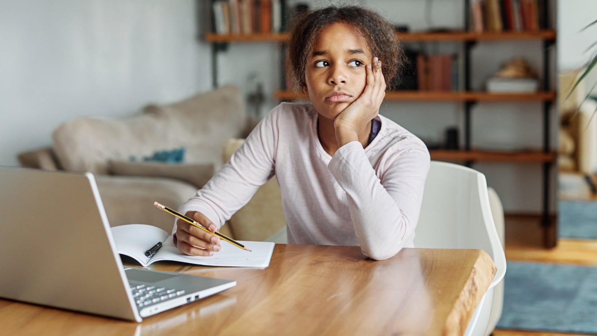 kid who is learning how to stretch her attention from being bored