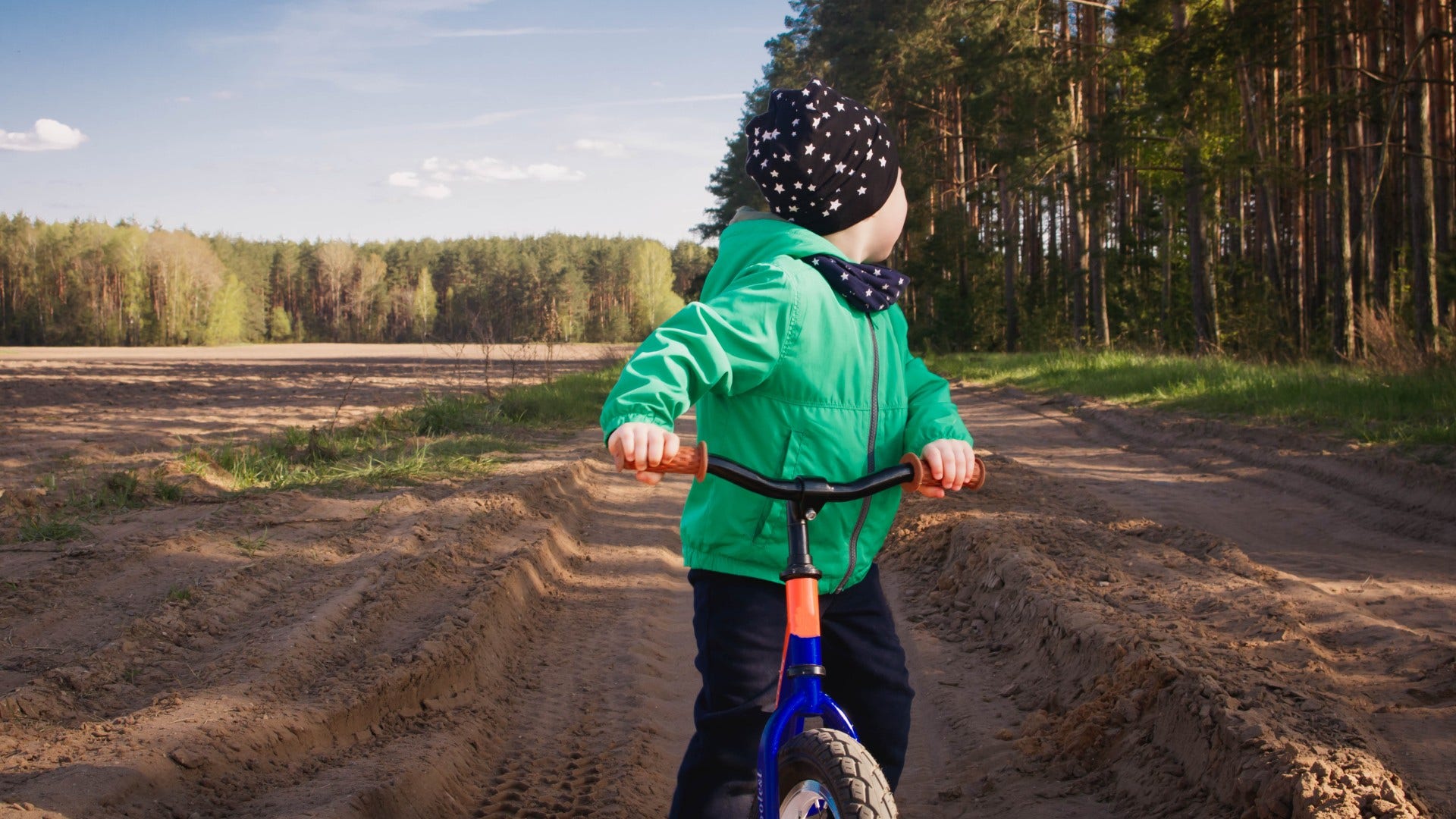 kid riding bike without a helmet that feels impossible now