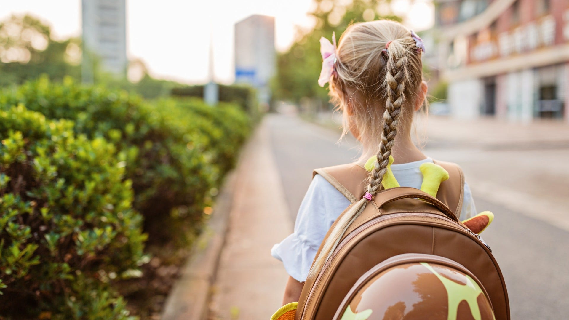 kid walking home from school that feels impossible now