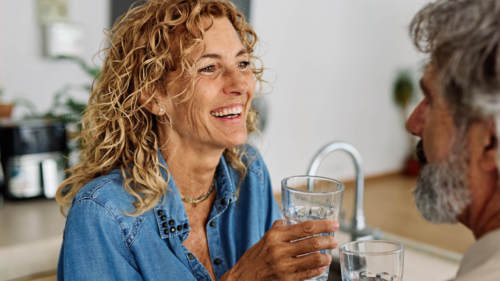 woman who's a confident flirter talking to her husband