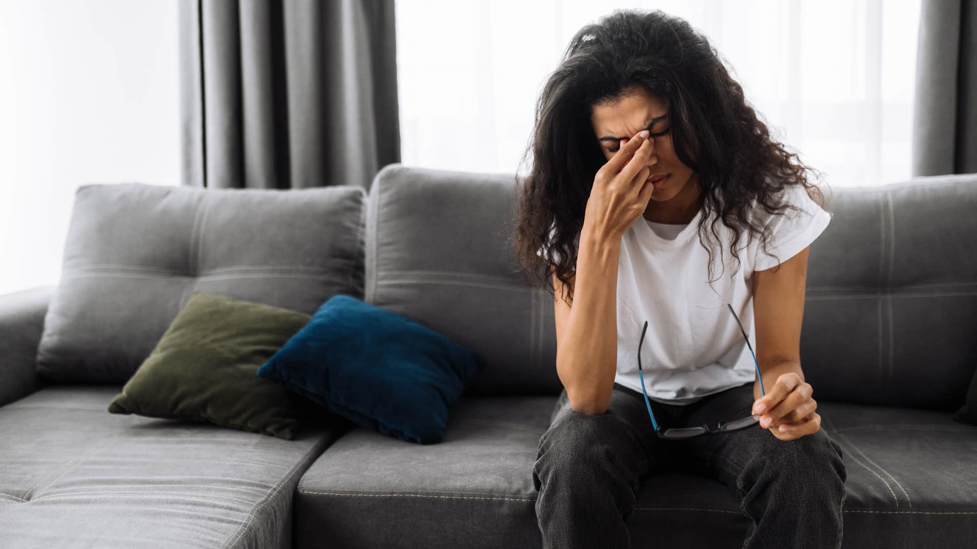 highly sensitive woman upset by background noise at home