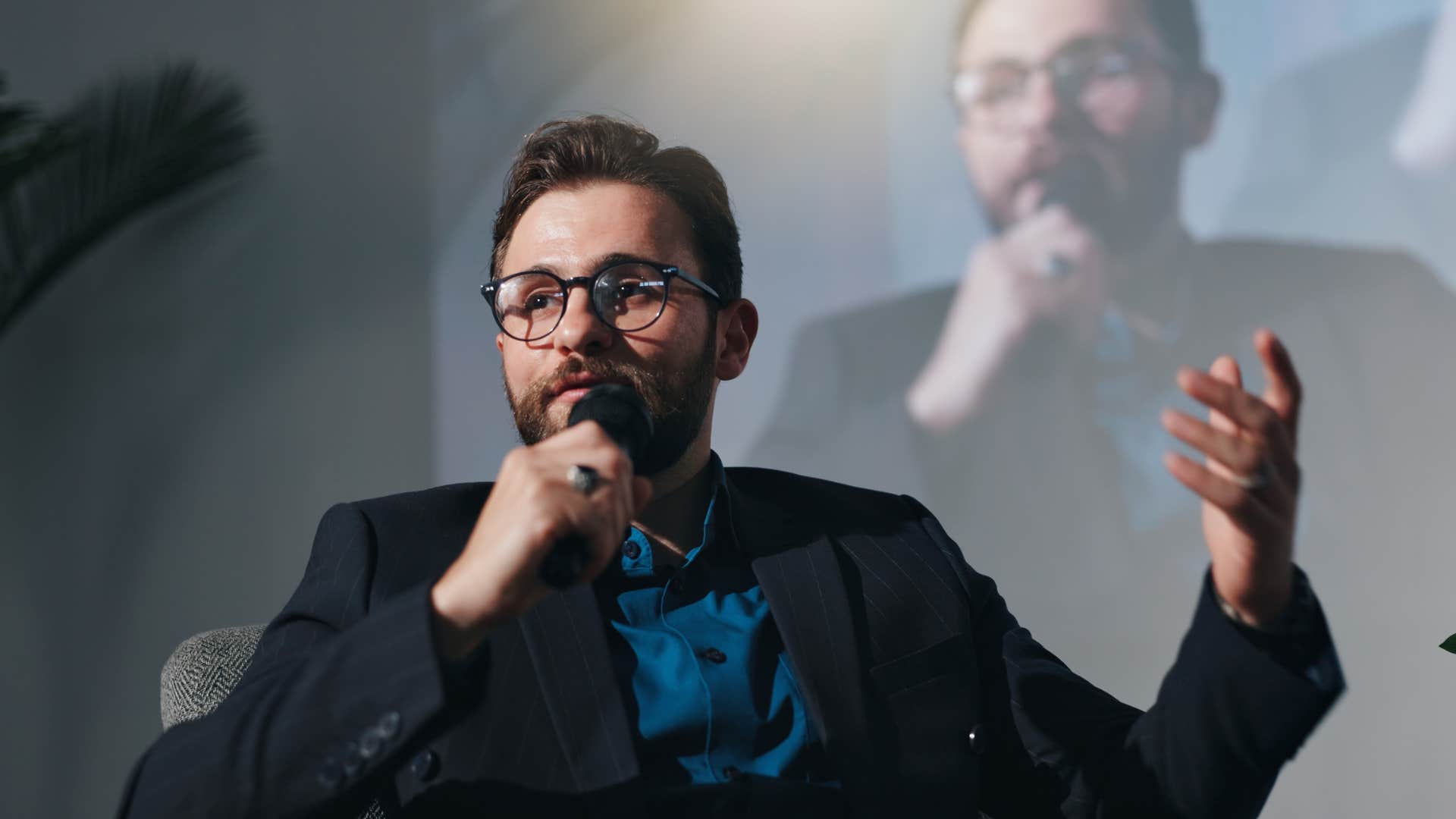 man doing public speaking engagement