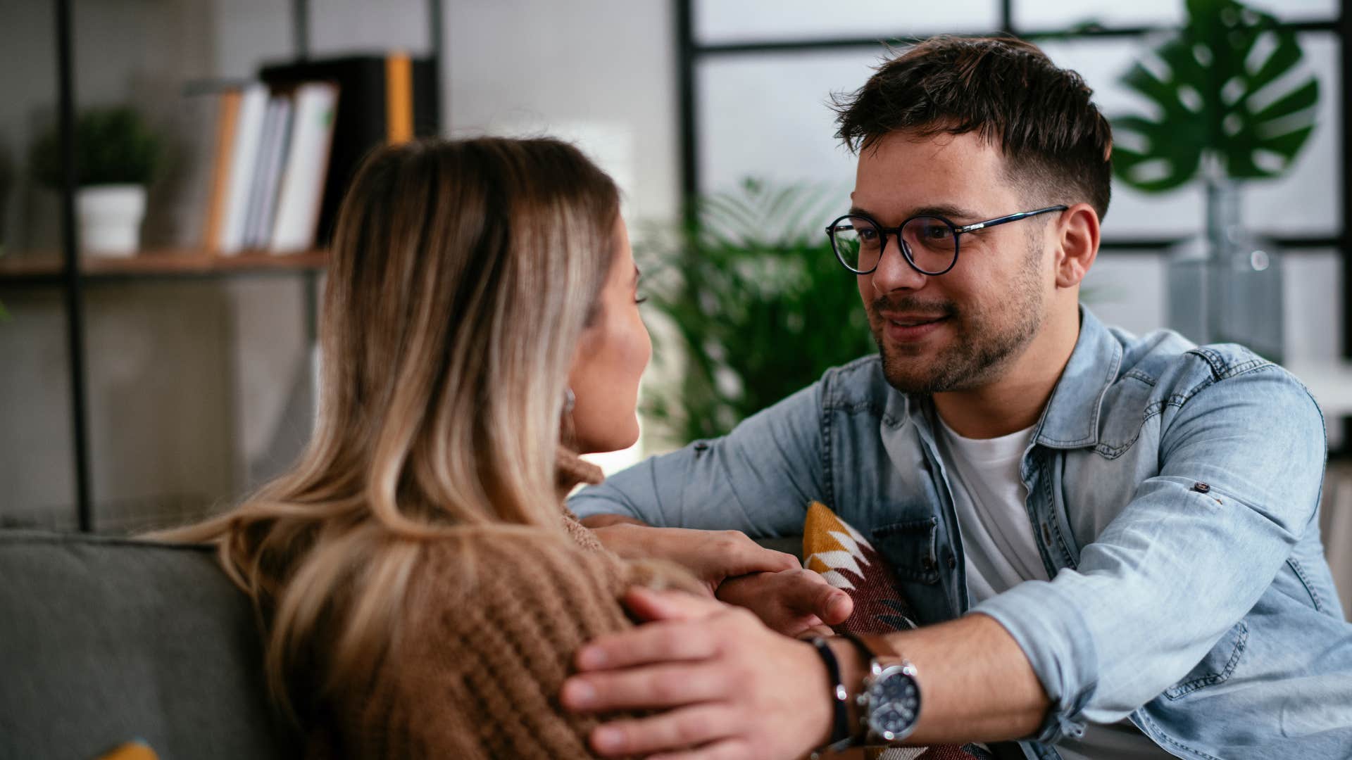 gentlemanly husband holding wife saying i trust you