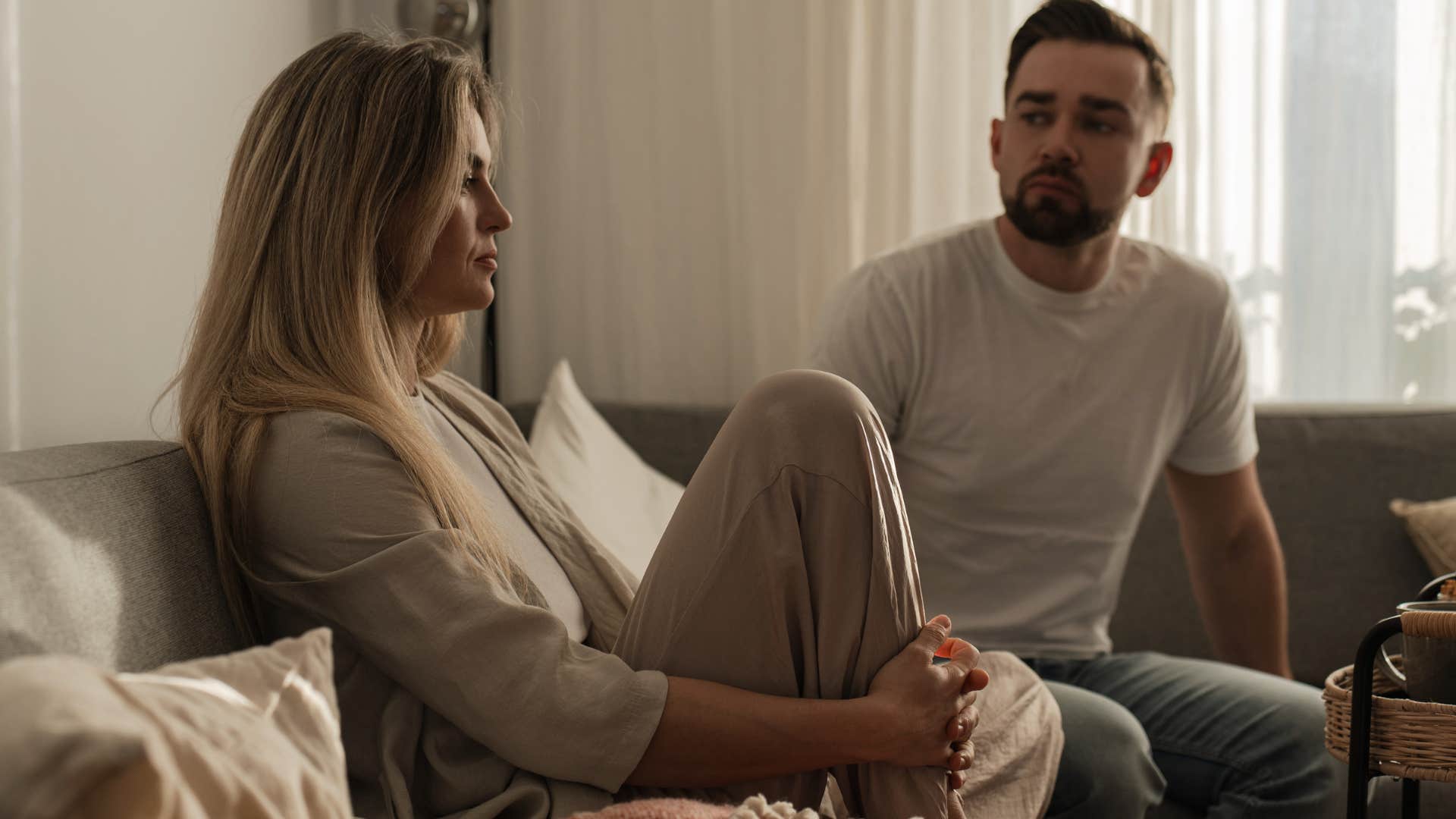 couple arguing woman saying you made your choice to her upset husband