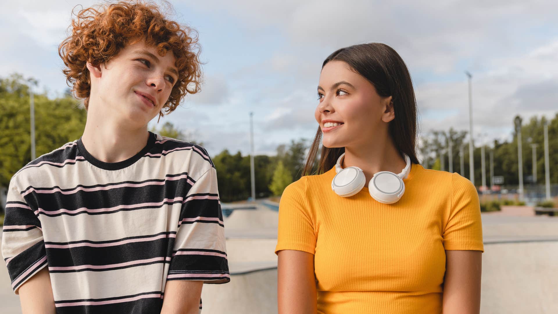 Teen boy and girl living differently than kids half a century kids ago