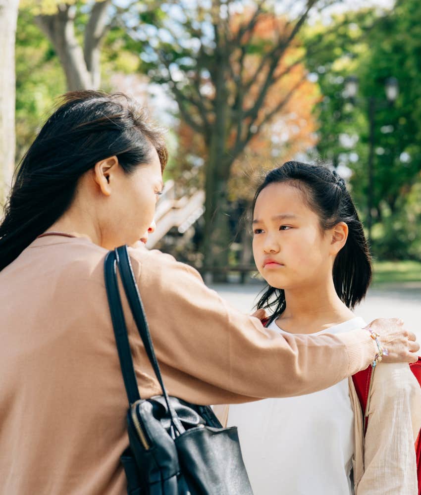 Confident mom encourages daughter showing popularity is not important