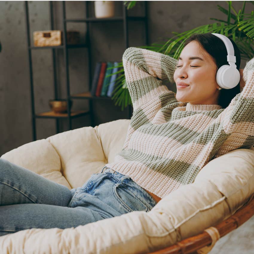 Woman lounging in chair anticipating rewards