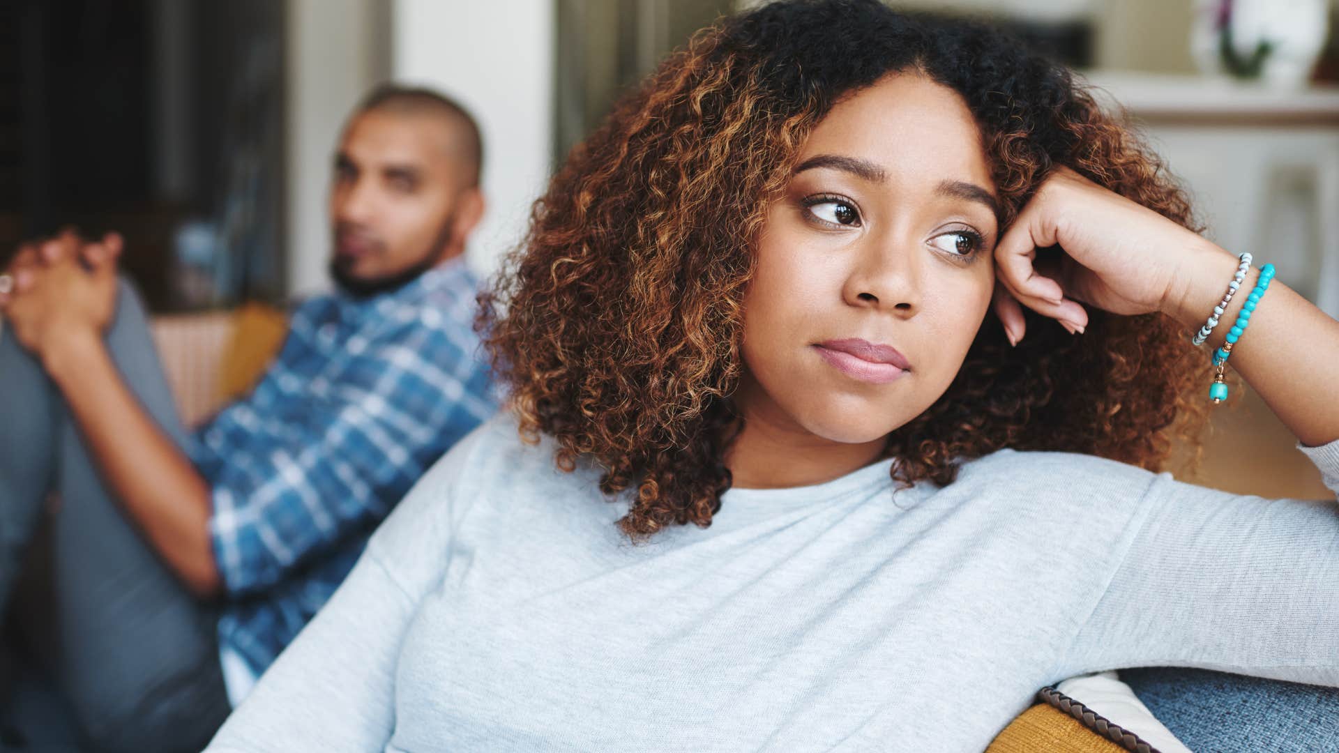 woman turned away from husband telling him I'm not talking about this