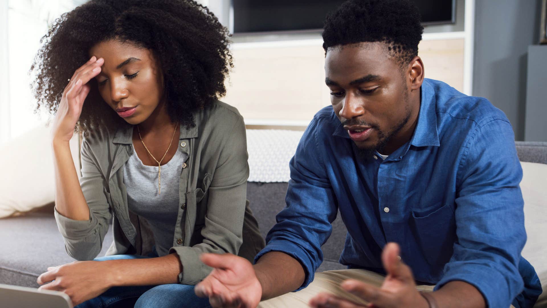 frustrated wife telling husband why can't you be more like him