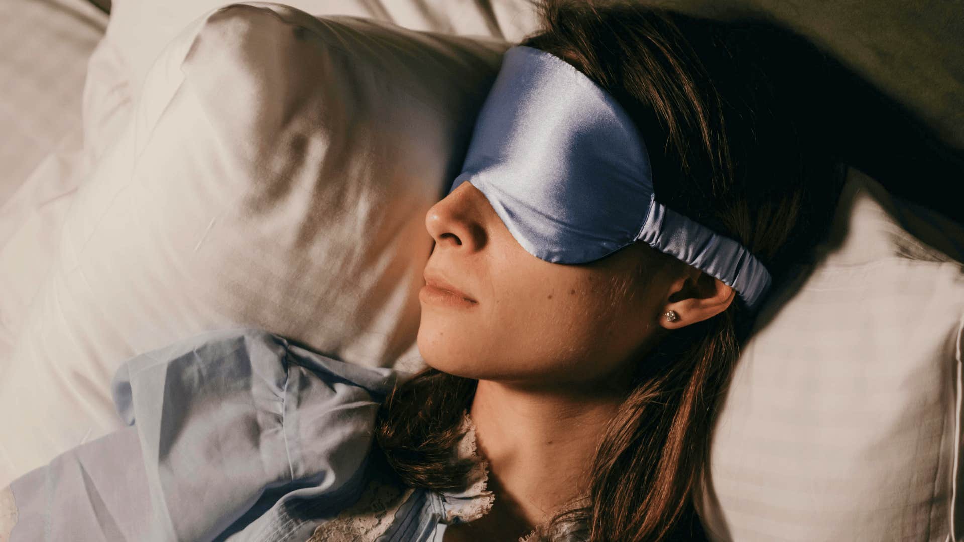 woman making her man feel something by sleeping well